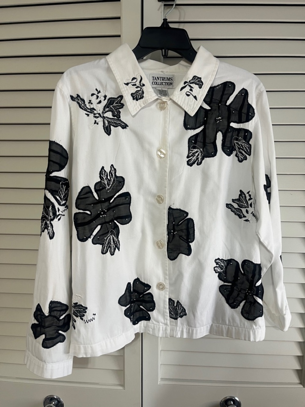 Tantrums White Jean Jacket with Black Floral Appliqué and Pockets